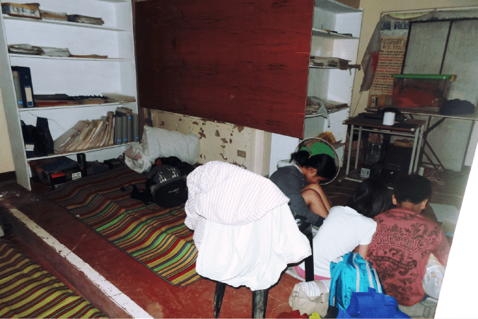 The room where around 50 of us lay overnight. My "spot" was by the pillow just below the plywood.